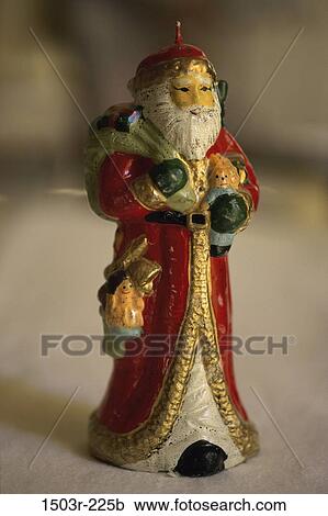 Stock Image - Christmas, candle, ornament, still life, painted, decoration, figurine. Fotosearch