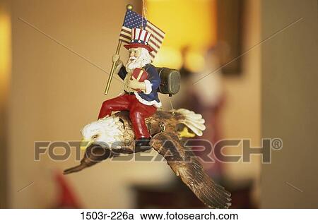 Christmas, patriotic, riding, ornament, flag, still life View Large Photo Image Stock Image - Christmas, patriotic, riding, ornament, flag, still life. Fotosearch