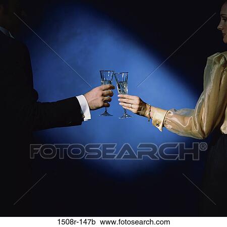dark, people, couple, toasting, champagne, drinking, alcoholic View Large Photo Image Stock Image - dark, people, couple, toasting, champagne, drinking, alcoholic. Fotosearch