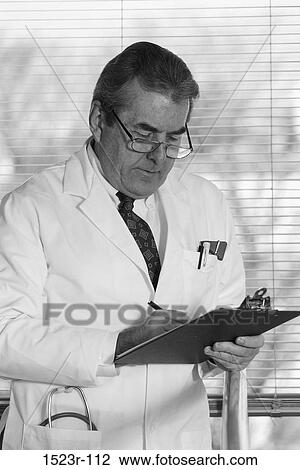doctor, chart, health, Middle-aged, writing, notes View Large Photo Image Stock Image - doctor, chart, health, Middle-aged, writing, notes. Fotosearch