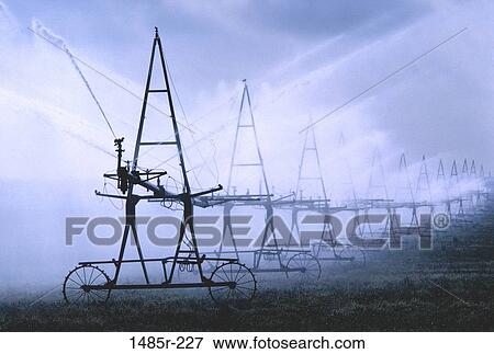 Stock Photo - farm, farming, crop, agriculture, irrigation, irrigate, irrigating. Fotosearch