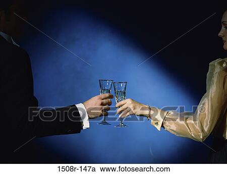 formal, glasses, celebration, couple, toasting, spotlight View Large Photo Image Stock Image - formal, glasses, celebration, couple, toasting, spotlight. Fotosearch