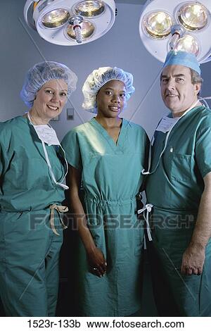 group, multiethnic, scrubs, surgery, health, Middle-aged, lights View Large Photo Image Stock Image - group, multiethnic, scrubs, surgery, health, Middle-aged, lights. Fotosearch