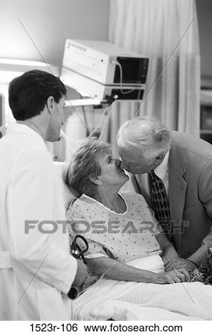 Stock Photograph - group, patient, doctor, health, black and white, caring. Fotosearch