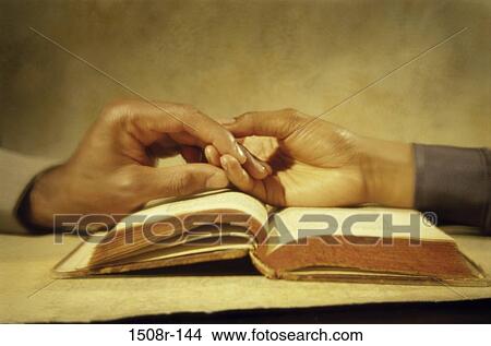 hand, hands, book, holding, romantic, body parts View Large Photo Image Picture - hand, hands, book, holding, romantic, body parts. Fotosearch