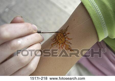 Stock Photo - hand, painting, arm, arts, paint, temporary. Fotosearch