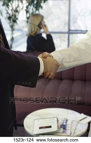 Picture - hands, deal, business, shaking, greeting, businessmen, gesture. Fotosearch