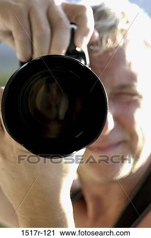 Stock Image - industry, outdoors, Middle-aged, camera. Fotosearch