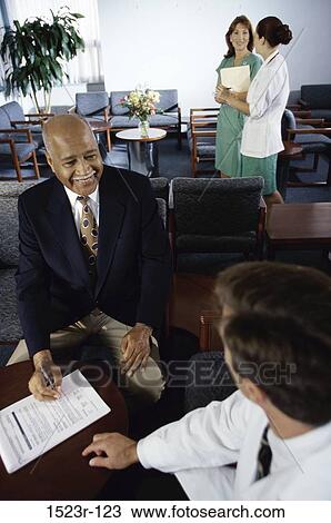 meeting, multiethnic, smiling, consultation, talking, conversation, consulting View Large Photo Image Stock Image - meeting, multiethnic, smiling, consultation, talking, conversation, consulting. Fotosearch