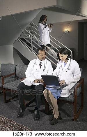 multiethnic, computer, laptop, typing, health, Middle-aged, using View Large Photo Image Stock Image - multiethnic, computer, laptop, typing, health, Middle-aged, using. Fotosearch