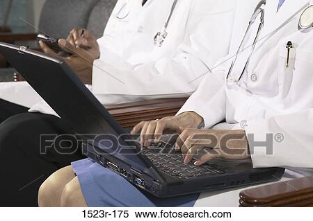 multiethnic, computer, laptop, typing, health, using View Large Photo Image Stock Photography - multiethnic, computer, laptop, typing, health, using. Fotosearch