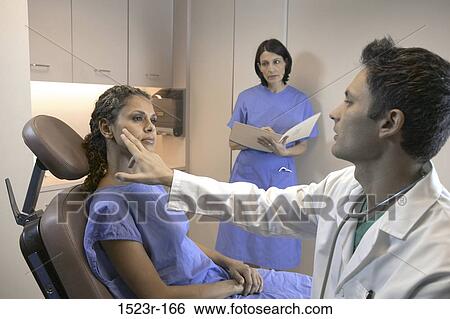 multiethnic, consultation, talking, conversation, patient, doctor View Large Photo Image Stock Photograph - multiethnic, consultation, talking, conversation, patient, doctor. Fotosearch