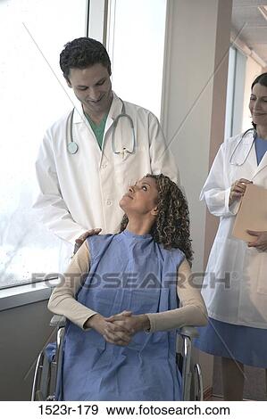 multiethnic, patient, wheelchair, health, Middle-aged, personnel, caring View Large Photo Image Stock Photo - multiethnic, patient, wheelchair, health, Middle-aged, personnel, caring. Fotosearch