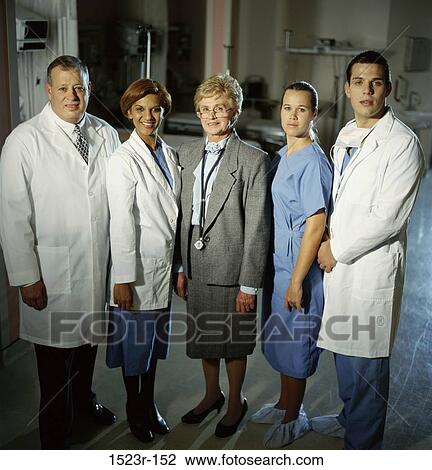 multiethnic, smiling, health, Middle-aged, posing, hospital View Large Photo Image Stock Image - multiethnic, smiling, health, Middle-aged, posing, hospital. Fotosearch