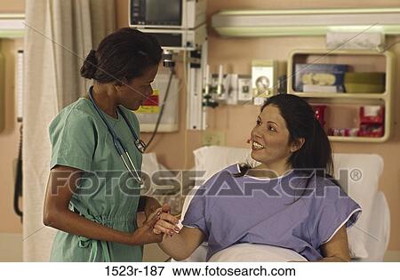 Stock Photo - multiethnic, women, consultation, talking, discussion, conversation. Fotosearch