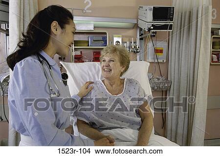 Picture - multiethnic, women, smiling, patient, doctor, health. Fotosearch