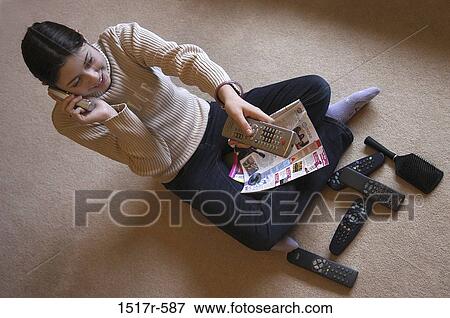 Stock Photo - overhead, people, telephone, talking, Asian, technology. Fotosearch
