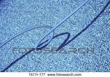 overhead, water, rope, shadow, sunlight, still life View Large Photo Image Stock Photo - overhead, water, rope, shadow, sunlight, still life. Fotosearch