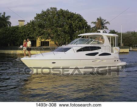 people, couple, boating, outdoors, sports, boat View Large Photo Image Stock Photo - people, couple, boating, outdoors, sports, boat. Fotosearch