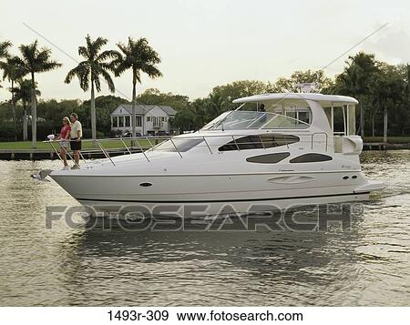 people, couple, boating, outdoors, sports, boat View Large Photo Image Stock Photo - people, couple, boating, outdoors, sports, boat. Fotosearch