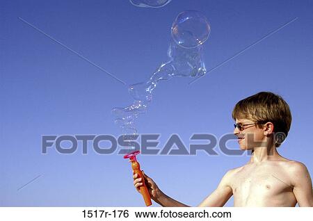 people, playing, bubbles, sunglasses, boy, outdoors View Large Photo Image Stock Photograph - people, playing, bubbles, sunglasses, boy, outdoors. Fotosearch