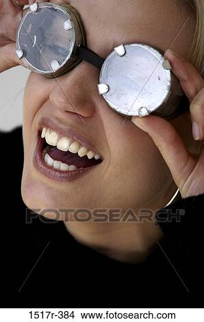 people, woman, eyeglasses, laughing, goggles, fun View Large Photo Image Picture - people, woman, eyeglasses, laughing, goggles, fun. Fotosearch