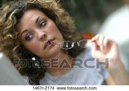 people, woman, eyeglasses, concentration, computer, concentrating View Large Photo Image Picture - people, woman, eyeglasses, concentration, computer, concentrating. Fotosearch