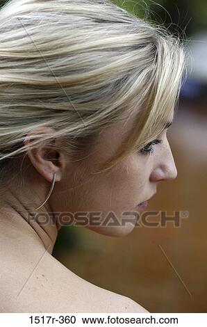 people, woman, profile, earring, blond, shoulder View Large Photo Image Stock Image - people, woman, profile, earring, blond, shoulder. Fotosearch
