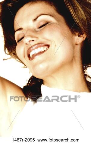 people, woman, smiling, smile, posing, happiness, enjoying View Large Photo Image Stock Photography - people, woman, smiling, smile, posing, happiness, enjoying. Fotosearch