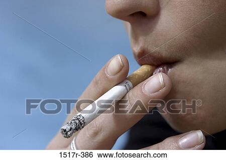people, woman, smoke, cigarette, holding, smoking View Large Photo Image Stock Photograph - people, woman, smoke, cigarette, holding, smoking. Fotosearch