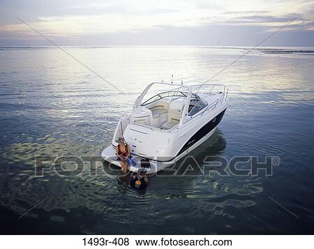 relaxation, water, talking, couple, sports, water sports View Large Photo Image Stock Photo - relaxation, water, talking, couple, sports, water sports. Fotosearch