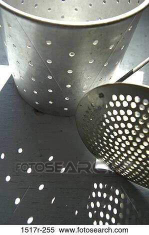 shadows, still life, metal, holes, supplies, housewares View Large Photo Image Stock Photography - shadows, still life, metal, holes, supplies, housewares. Fotosearch