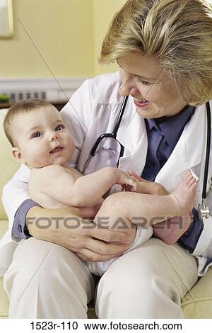 smiling, baby, holding, doctor, health, smile, personnel View Large Photo Image Stock Image - smiling, baby, holding, doctor, health, smile, personnel. Fotosearch
