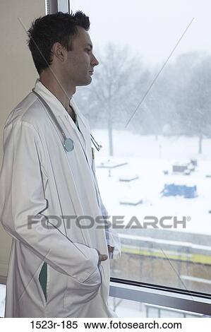 staring, window, doctor, health, Middle-aged, contemplating View Large Photo Image Stock Photography - staring, window, doctor, health, Middle-aged, contemplating. Fotosearch