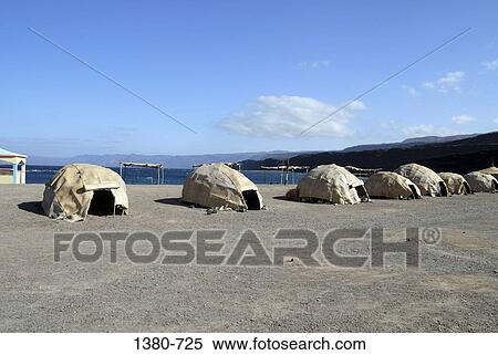 Stock Photography - Afar huts on the beach, Djibouti. Fotosearch