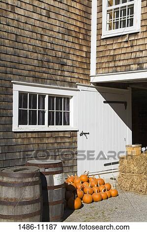 Barrels and pumpkins outside a building, Canterbury Shaker Village, Canterbury, New Hampshire, USA View Large Photo Image Stock Photo - Barrels and pumpkins outside a building, Canterbury Shaker Village, Canterbury, New Hampshire, USA. Fotosearch