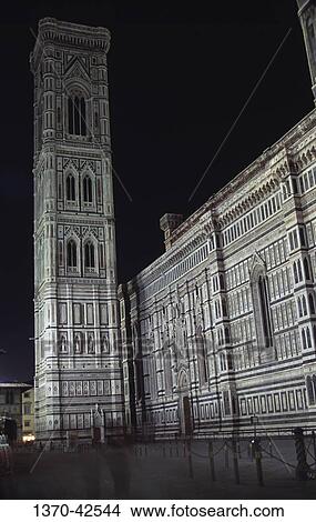 Bell tower near a cathedral, Duomo Santa Maria del Fiore, Florence, Tuscany, Italy View Large Photo Image Picture - Bell tower near a cathedral, Duomo Santa Maria del Fiore, Florence, Tuscany, Italy. Fotosearch