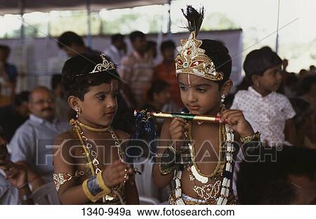 Boy and a girl in costumes in a religious festival of Krishna Janmashtami, Tamil Nadu, India View Large Photo Image Stock Image - Boy and a girl in costumes in a religious festival of Krishna Janmashtami, Tamil Nadu, India. Fotosearch