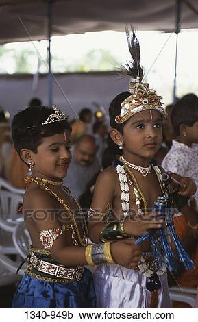 Boy and a girl in costumes in a religious festival of Krishna Janmashtami, Tamil Nadu, India View Large Photo Image Stock Image - Boy and a girl in costumes in a religious festival of Krishna Janmashtami, Tamil Nadu, India. Fotosearch