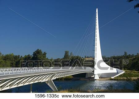 Bridge across a bay, Sundial Bridge, Turtle Bay Exploration Park, Redding, California, USA View Large Photo Image Stock Image - Bridge across a bay, Sundial Bridge, Turtle Bay Exploration Park, Redding, California, USA. Fotosearch