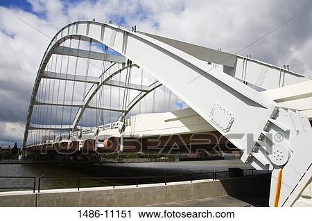 Bridge across a river, Frederick Douglass-Susan B. Anthony Memorial Bridge, Rochester, New York State, USA View Large Photo Image Stock Image - Bridge across a river, Frederick Douglass-Susan B. Anthony Memorial Bridge, Rochester, New York State, USA. Fotosearch