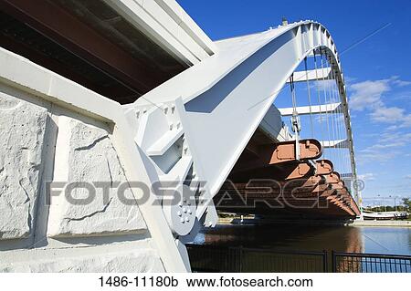Bridge across a river, Frederick Douglass-Susan B. Anthony Memorial Bridge, Rochester, New York State, USA View Large Photo Image Stock Image - Bridge across a river, Frederick Douglass-Susan B. Anthony Memorial Bridge, Rochester, New York State, USA. Fotosearch