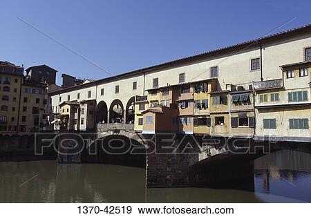 Bridge across a river, Ponte Vecchio, Florence, Tuscany, Italy View Large Photo Image Stock Photo - Bridge across a river, Ponte Vecchio, Florence, Tuscany, Italy. Fotosearch