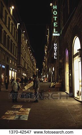 Buildings lit up at night in a city, Florence, Tuscany, Italy View Large Photo Image Stock Photo - Buildings lit up at night in a city, Florence, Tuscany, Italy. Fotosearch