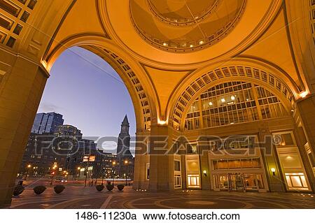 Stock Image - Buildings viewed from an arch of a building, Rowe's Wharf, Boston Harbor, Boston, Massachusetts, USA. Fotosearch