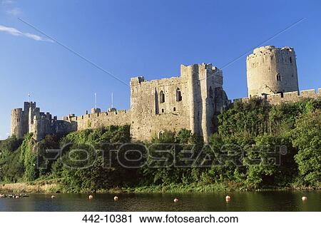 Castle at the riverbank, Pembroke Castle, Pembroke, Pembrokeshire, Wales View Large Photo Image Stock Image - Castle at the riverbank, Pembroke Castle, Pembroke, Pembrokeshire, Wales. Fotosearch