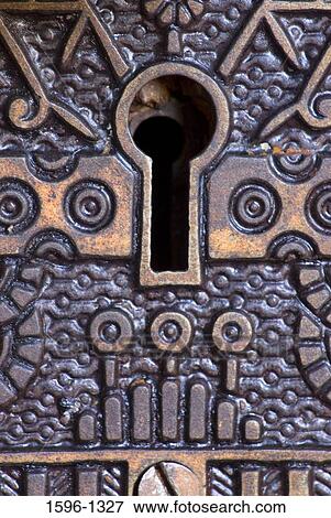 Stock Photo - Close-up of a keyhole. Fotosearch