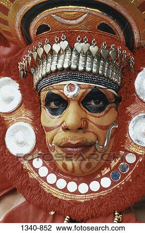 Close-up of a Theyyam dancer, Kerala, India View Large Photo Image Stock Image - Close-up of a Theyyam dancer, Kerala, India. Fotosearch