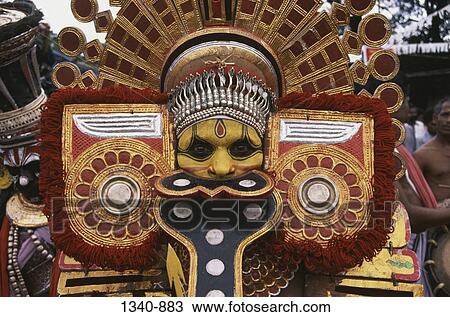 Close-up of a Theyyam dancer, Kerala, India View Large Photo Image Stock Image - Close-up of a Theyyam dancer, Kerala, India. Fotosearch