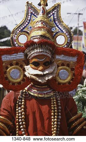 Close-up of a Theyyam dancer, Kerala, India View Large Photo Image Stock Photo - Close-up of a Theyyam dancer, Kerala, India. Fotosearch